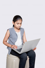 indian girl attending online school , due to cavide-19.