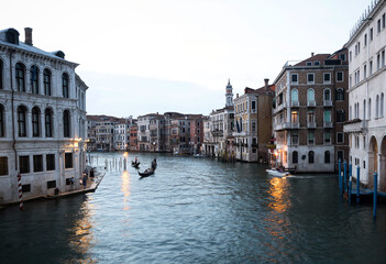 Panorama view of typical traditional gondola tourist boat ship ride in Grand Canal of Venice...
