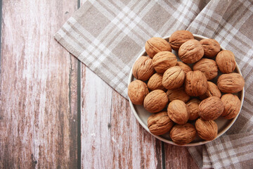 hard brown walnut fruit in shell