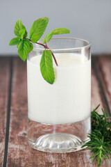 milk drink in a glass cup for a kefir diet