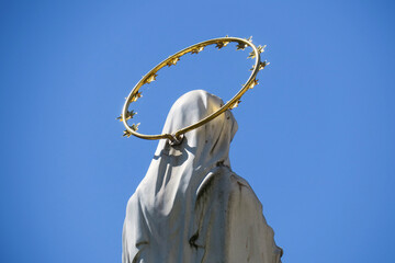 Sculpture of the Mother of God with a halo on her head