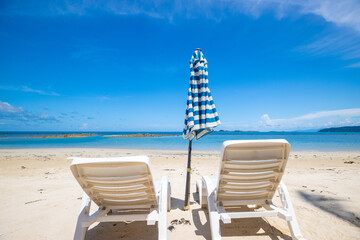 lounge chairs on the beach