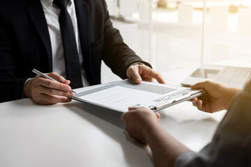 Job applicants submit job applications to job interviewers.