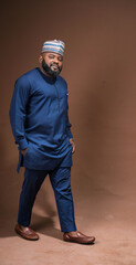 Portrait of Nigerian business man wearing traditional attire