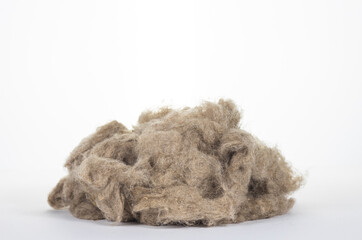 Raw flax fiber isolated on white background