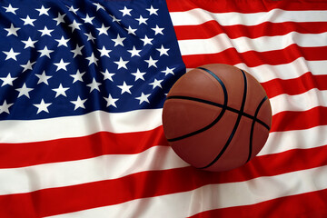 BASKETBALL BALL ON THE AMERICAN FLAG. USA BASKETBALL SUCCESS.