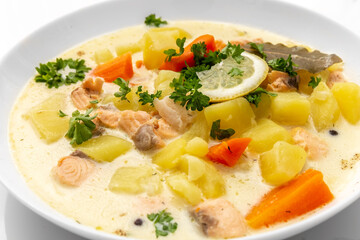Traditional Finnish Salmon Soup. White background. Healthy food. High quality photo