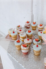 
A delicious biscuit with butter cream and strawberries, a snack for a children's party, a dessert for the whole family. Diet cake