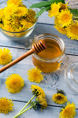 Honey from dandelions fresh flowers.