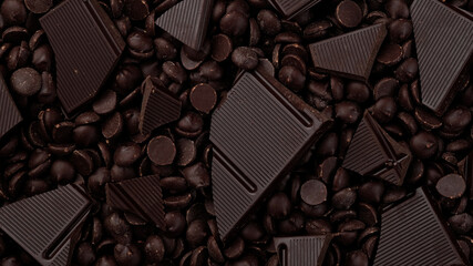 broken dark chocolate bar and chocolate chips top view, rotation