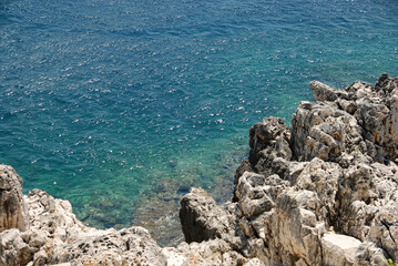 Cliff overlooking the azure sea in the Mediterranean