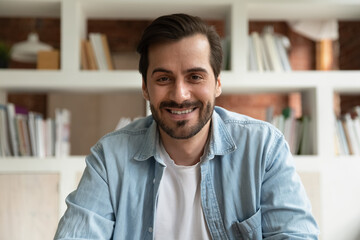 Head shot portrait smiling man making video call, chatting online in social network, coach shooting...