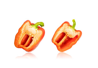 Red bell pepper cut in half isolated on white background with clipping​ path​