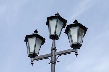 Fototapeta na wymiar Vintage lantern. Street lighting. Vintage lamp.