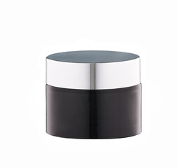 Black glass jar of beauty cream with silver cap isolated on white background.