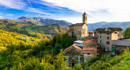 Fototapeta na wymiar Idyllic small village in mountains - Castelcanafurone,Piacenza, Emilia-Romagna,Italy. Italian scenery and traditional villages