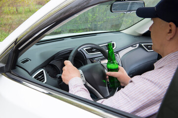 An alcoholic driving a car