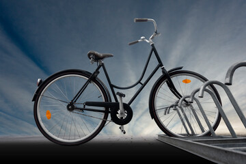 Fototapeta na wymiar black traditional parked bike