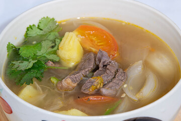 Beef Soup with tomato and potatoThai style.