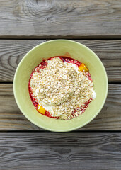 A dessert with yoghurt and fruits in a bowl
