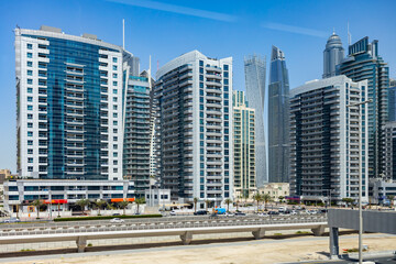 Fototapeta na wymiar Sheikh Zayed Road on sunny day. Dubai, UAE