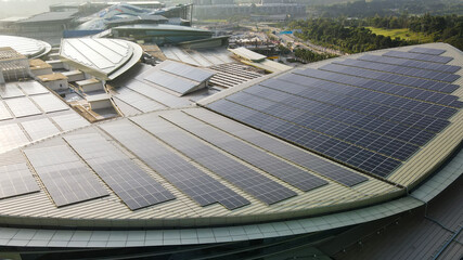Aerial view of a solar panel on building roof top. Part of reduce reuse and restore, Renewable energy concept
