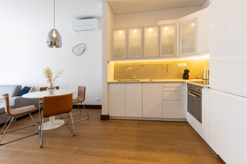 Interior of a modern kitchen with dining area
