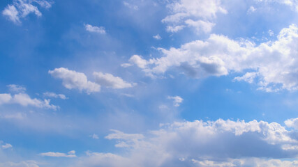 Beautiful blue spring sky with wind-blown clouds	