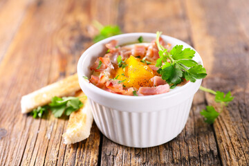 baked egg with cream and bacon