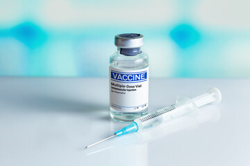 Vaccine equipment and syringe to administer vaccine doses to the population. Generic injectable vaccines vials for the vaccination program against diseases and infections prevention