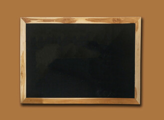 Empty blank blackboard texture with wooden brown frame.