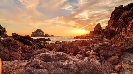 Fototapeta na wymiar ocean rock sunset spot japan 