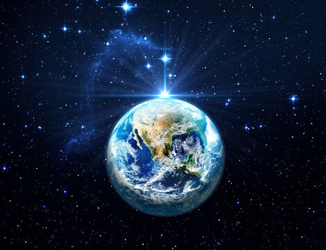 Planet Earth in starry space. Dark blue night sky with bright stars. Christmas Star of Bethlehem Nativity, christmas of Jesus Christ. Elements of this image furnished by NASA