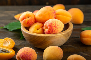 Delicious ripe apricots and leaves