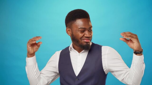 African american man showing bla-bla sign against blue background