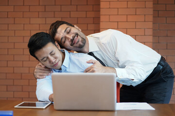 Man or gay boss touching and hug his Asian employee or colleague body in office as sexual harassment and enforcement