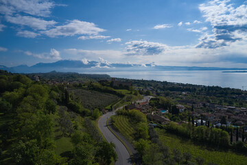 Aerial view of the historic part of Padenghe Castle on Lake Garda, Italy. Historic castles in Italy. Top view of the castle. Panorama of Lake Garda.