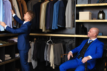 Beautiful gay couple in the store.