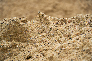 wet sand surface for construction, close view