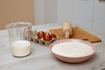 dough ingredients on table in kitchen