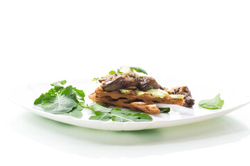 fried toast with cheese spread, arugula and fried mushrooms