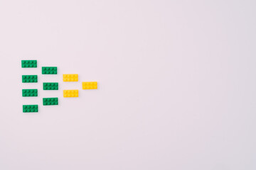 Plastic building blocks on white background