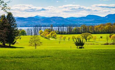 spring time view of Lake Champlain in Vermont and the Adirondack Mountains in New York
