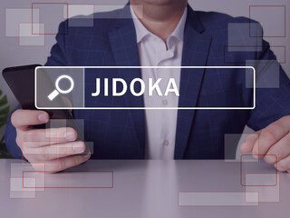  JIDOKA text in search line. Manager looking for something at smartphone. JIDOKA concept.