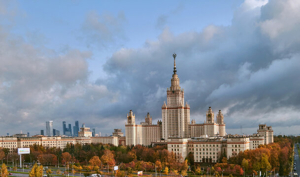 Aerial panoramic view of sunset  campus buildings of famous Moscow university under dramatic cloudy sky in autumn
