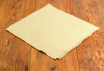 Background of the empty textile table mat on rustic table