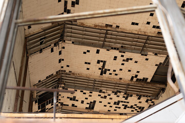 Collapsing high ceiling of an old industrial building