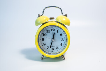 Close-up colorful clock. Colorful clock with white background. Old-style decorative clock.