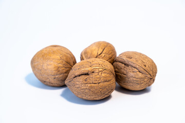 Walnuts with a white background. Healthy organic foods, snacks. Organic walnuts.