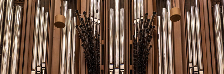 Fragment of organ at the Moscow House of Music, register with different pipes from metal, musical...